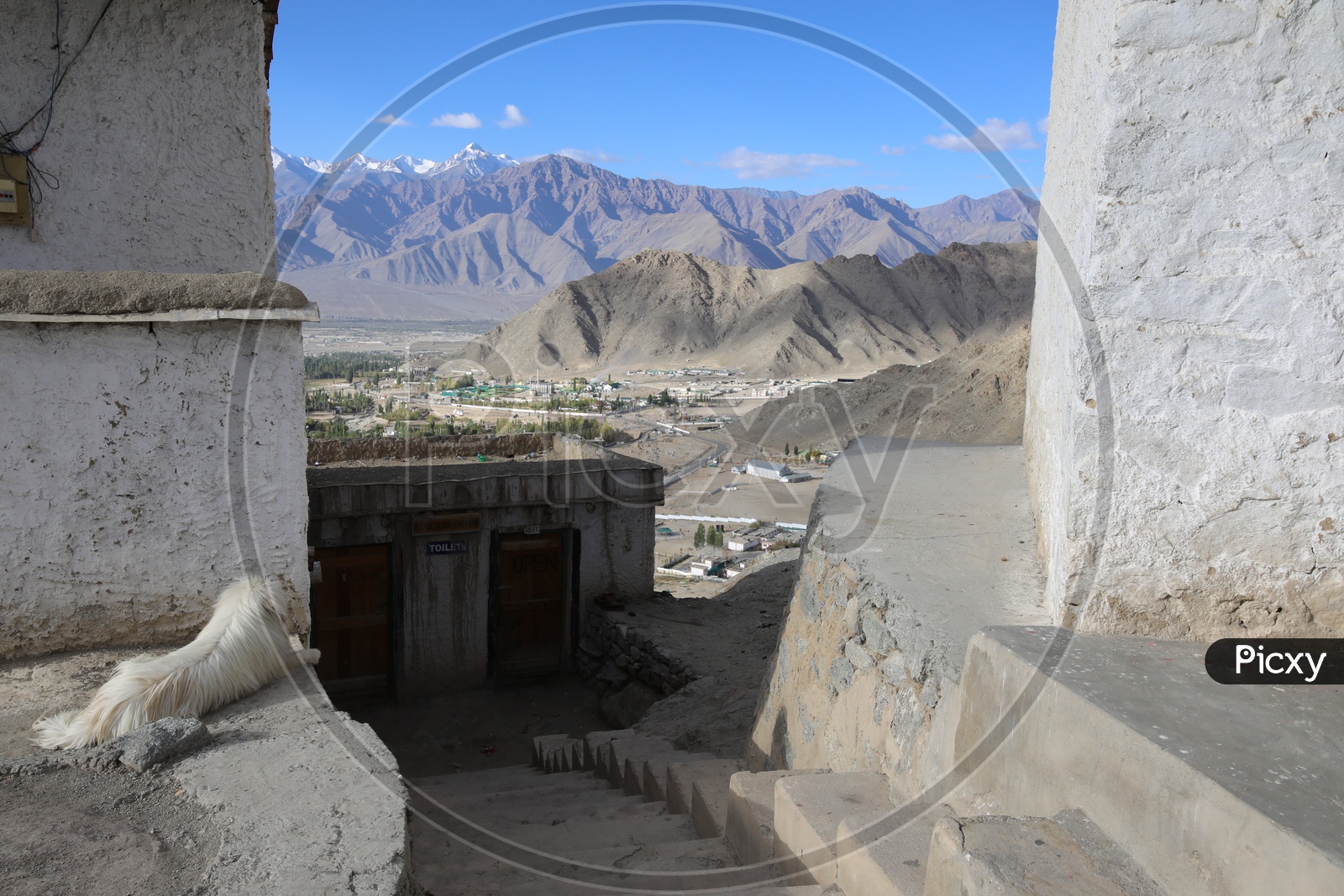 Beautiful Landscape of Snow Capped Mountains of Leh with leh village in the foreground