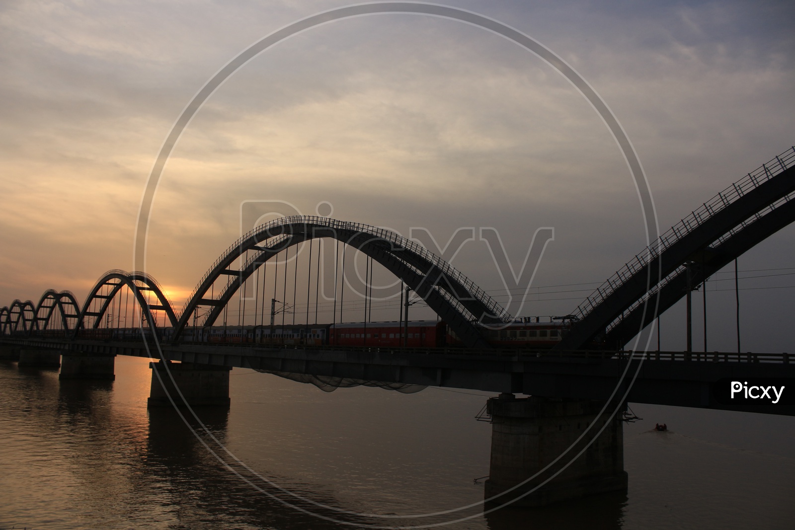 A Beautiful View Of Godavari bridge With train and sunset