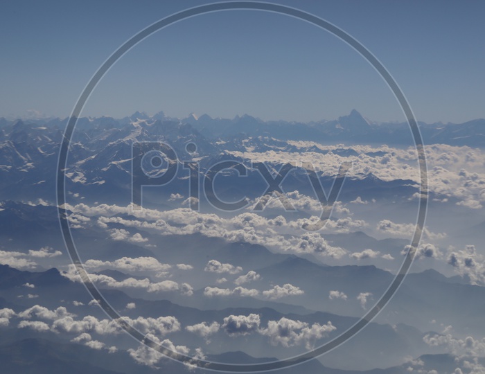 Beautiful Landscape of Snow Capped Mountains of Leh from flight window / Leh mountains in Aerial View