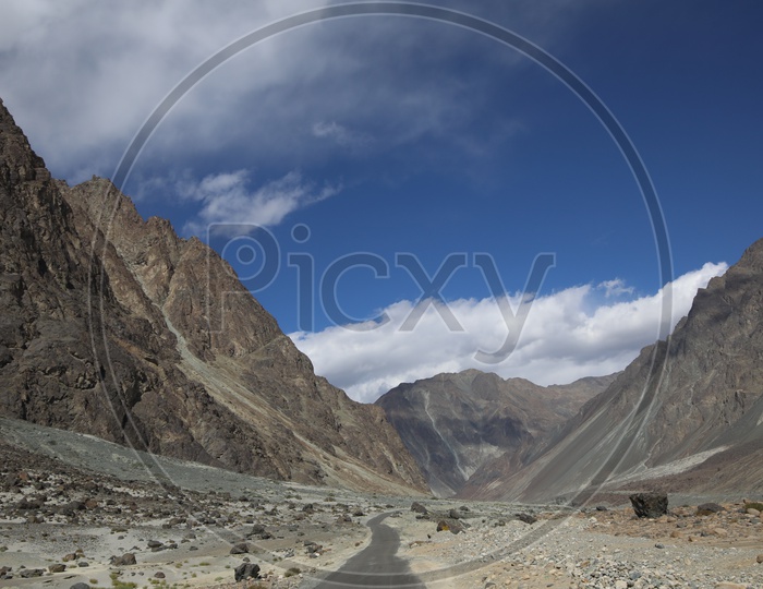 Roadways of leh with beautiful snow capped mountains in the background
