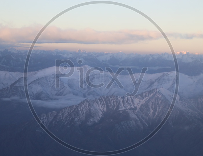 Beautiful Landscape of Snow Capped Mountains of Leh from flight window / Leh mountains in Aerial View