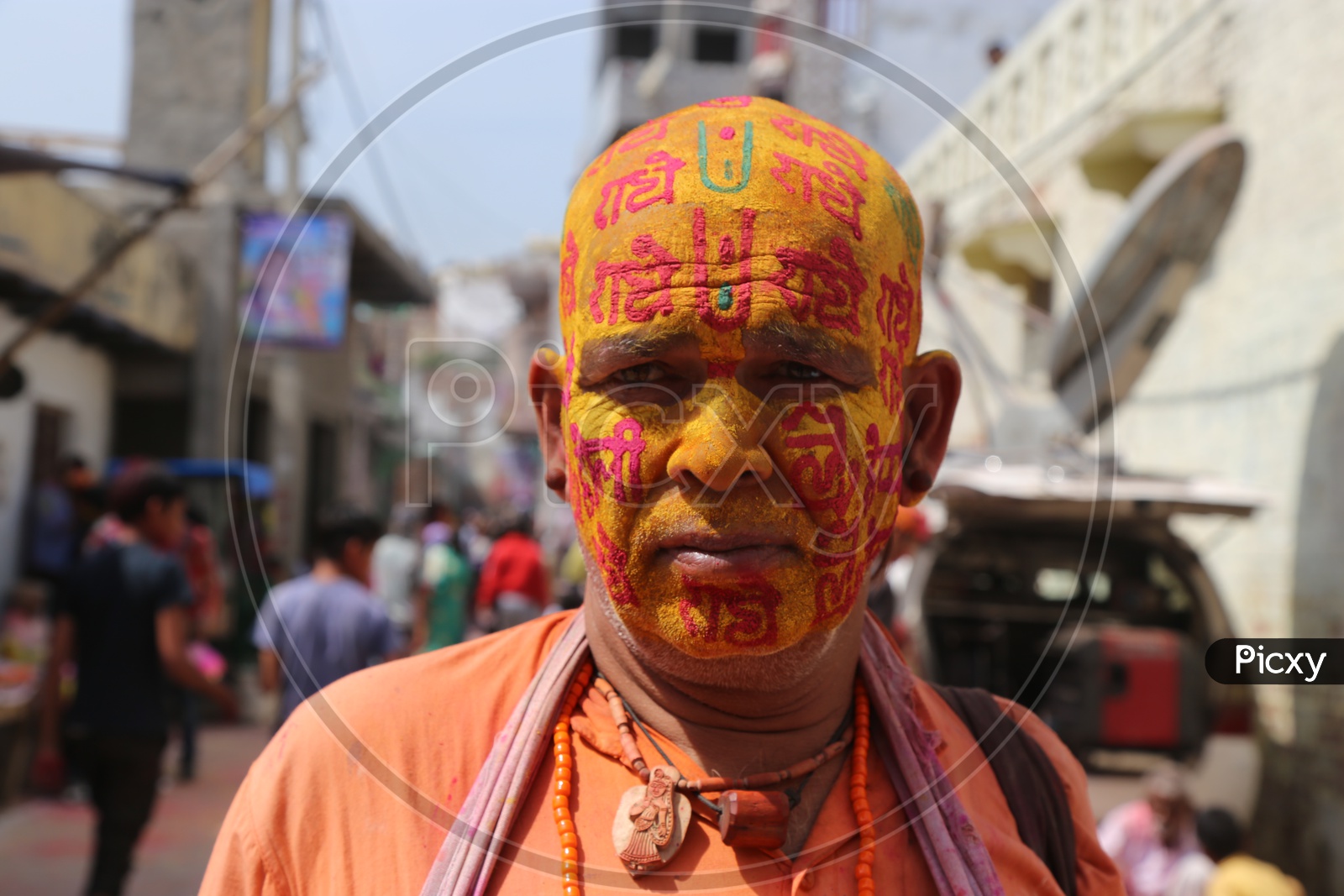 Old man with Colors on his face - Holi Celebrations - Indian Festival - Colors/Colorful at Nandagaon