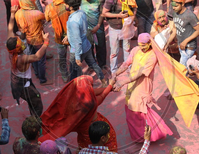 Holi Celebrations - Indian Festival - Colors/Colorful at Nandagaon - Couple Dancing