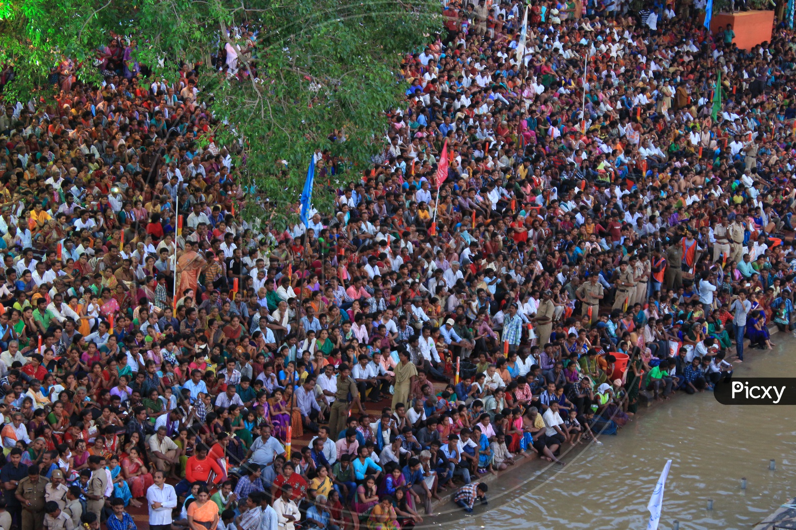 An Aerial View Of Hindu Pilgrims Watching The Holy Aarti / Harathi Of Godavari River in Rajahmundry