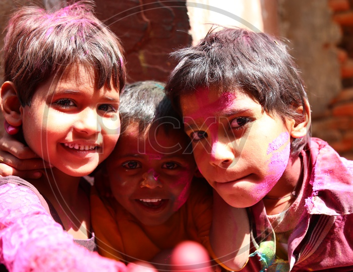 Children Celebrating Holi Festival in Nandgaon