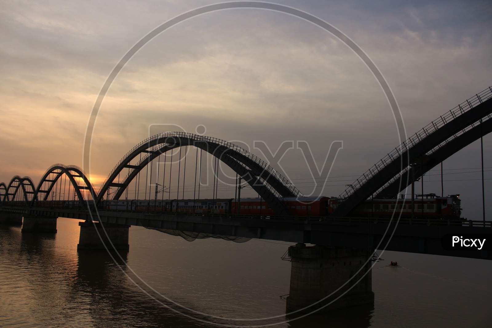 A Beautiful View Of Godavari bridge With train and sunset