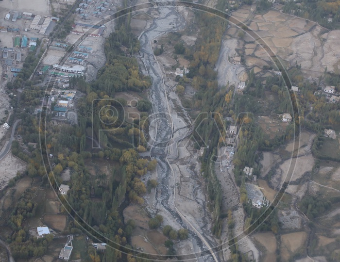 Leh village in aerial view captured from flight window