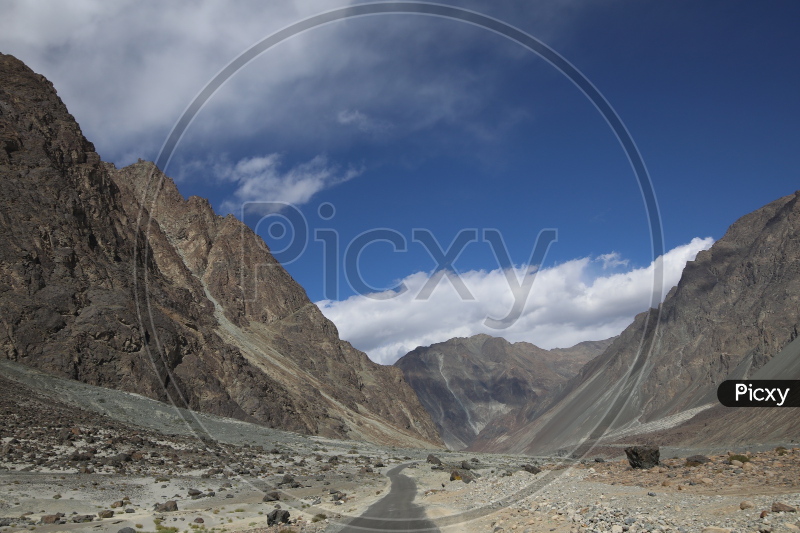 Roadways of leh with beautiful snow capped mountains in the background