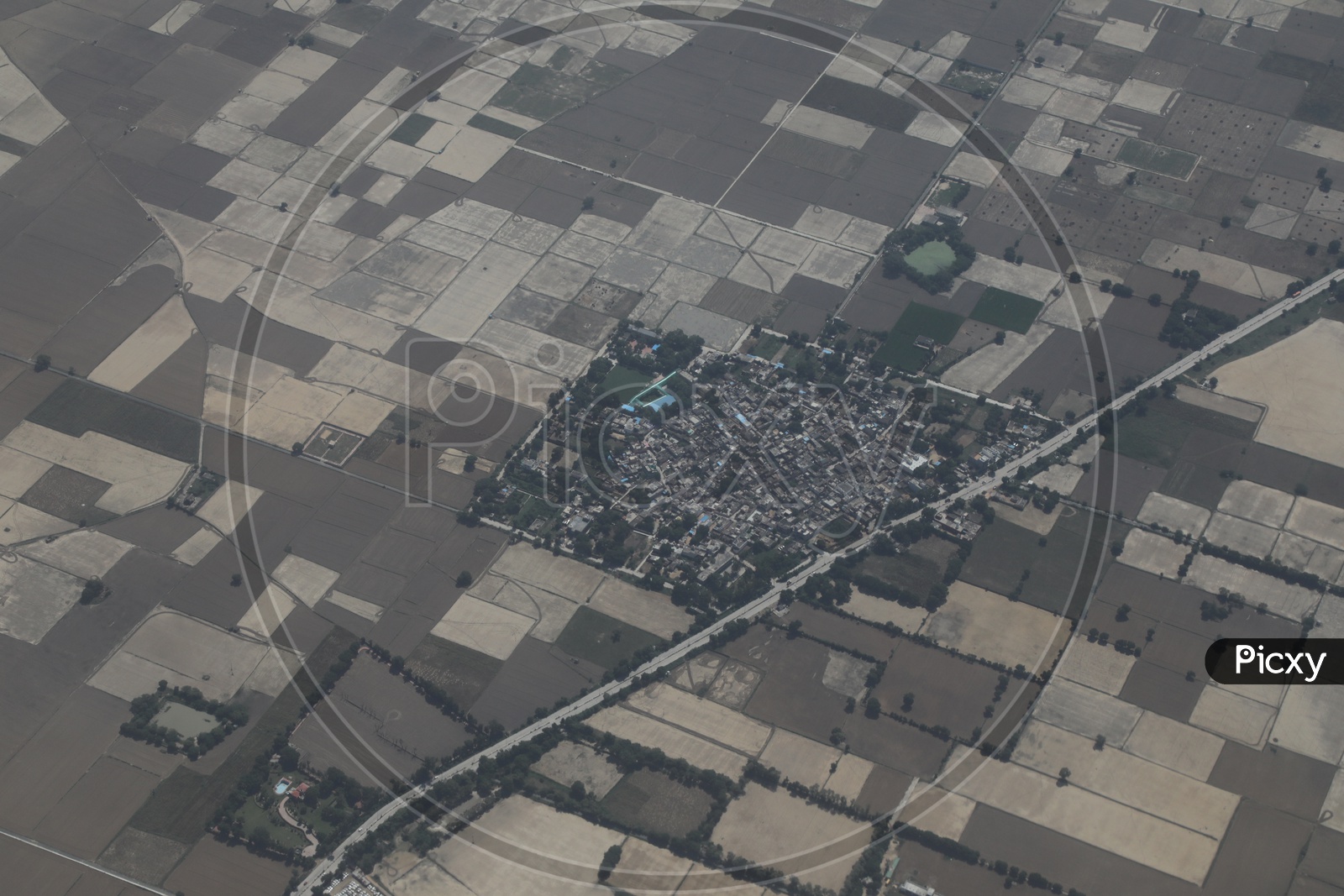 delhi in aerial view from flight window