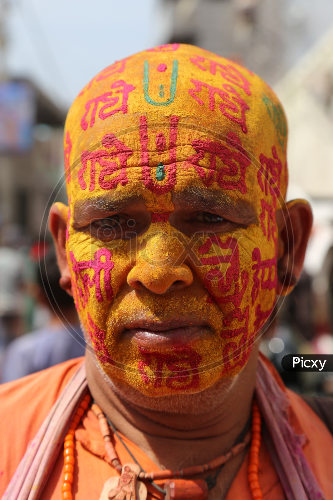 Old Man with Colors on his face - Holi Celebrations - Indian Festival - Colors/Colorful at Nandagaon