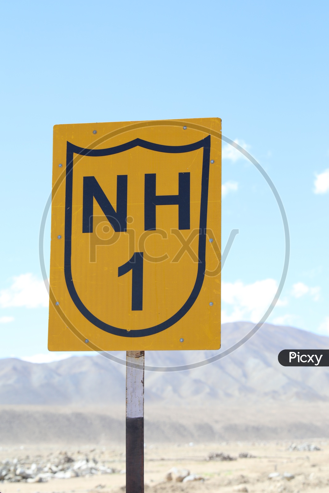 NH1 road sign board in Leh