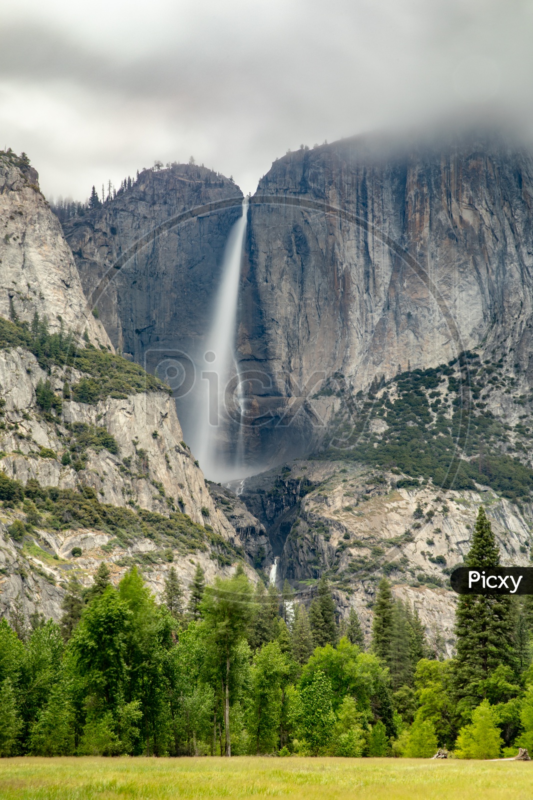 A Beautiful Water Falls Falling From The Mountains in Yosemite Valley