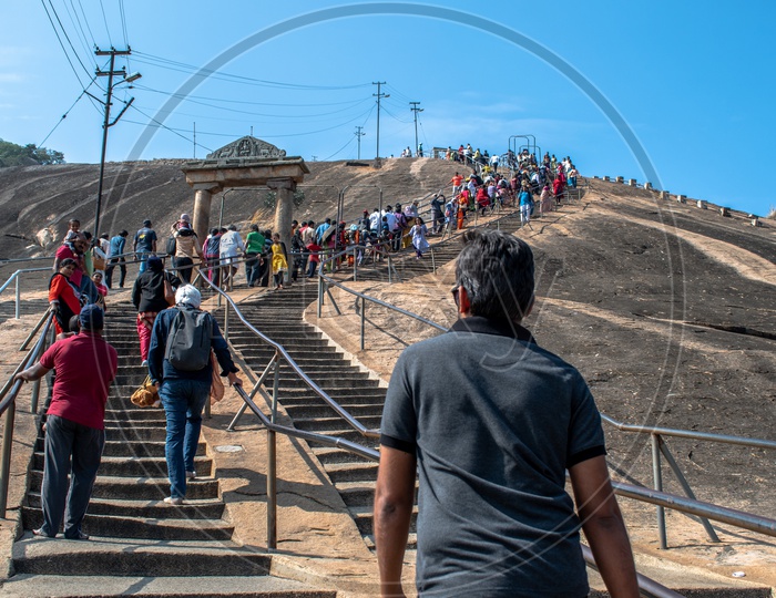 Climbing steps to reach Bhagawan Bahubali Statue, Shravanabelagola, Karnataka, India