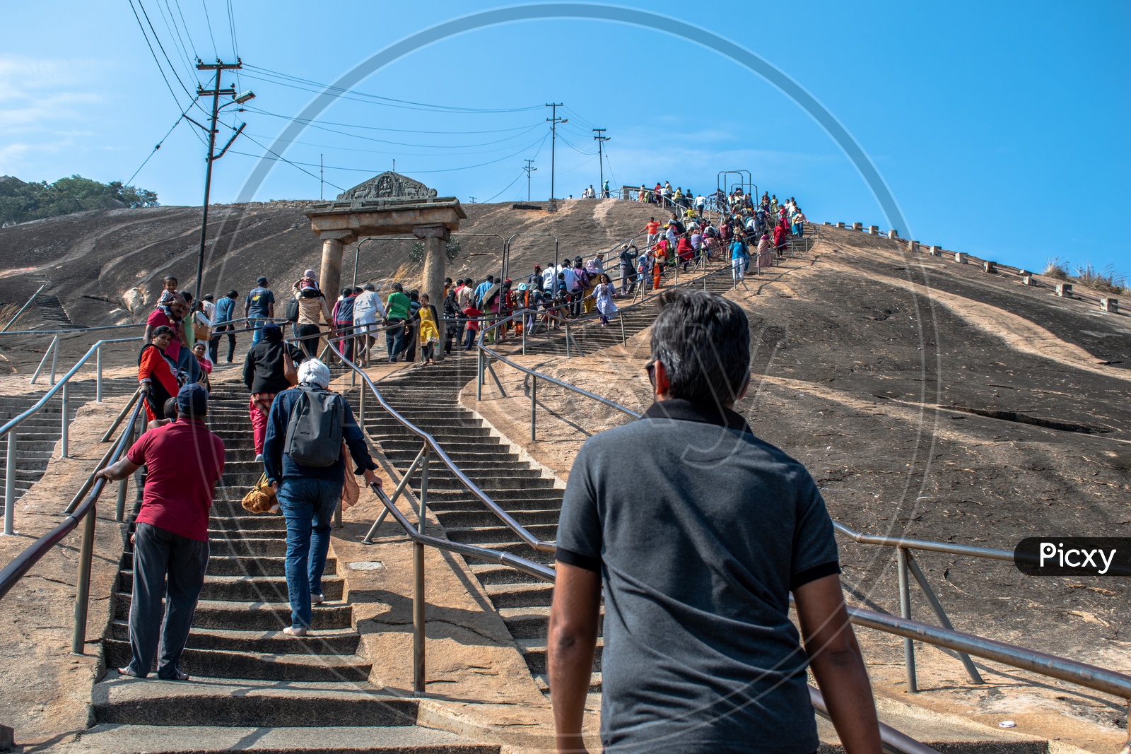 Climbing steps to reach Bhagawan Bahubali Statue, Shravanabelagola, Karnataka, India