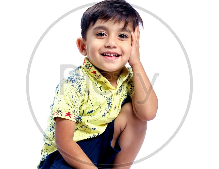 cute little kid with happy and smiling face ,face toward the camera