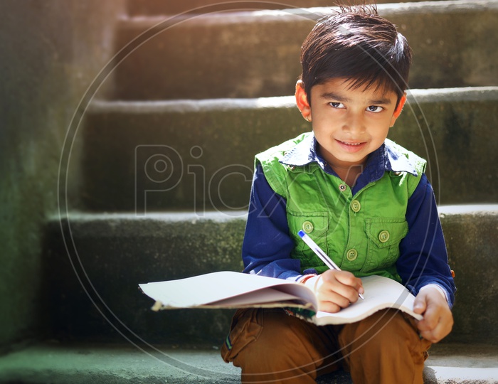 Indian Child doing Home work