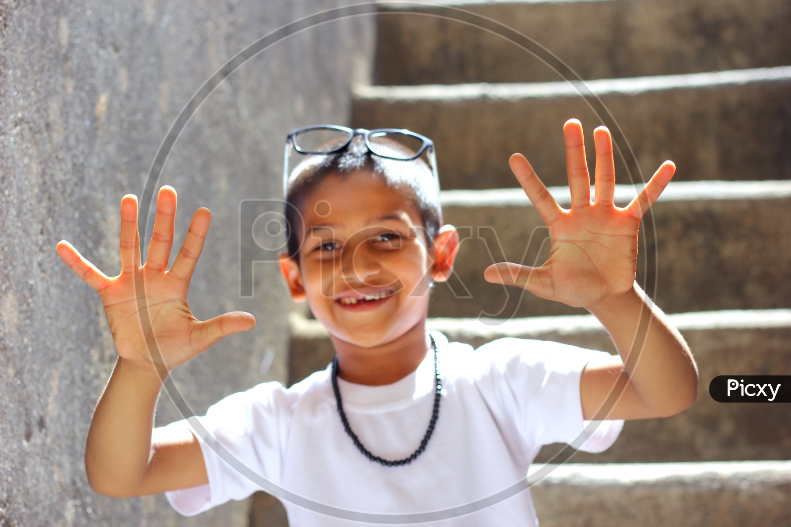 Indian Child showing Hands or Indian Kid