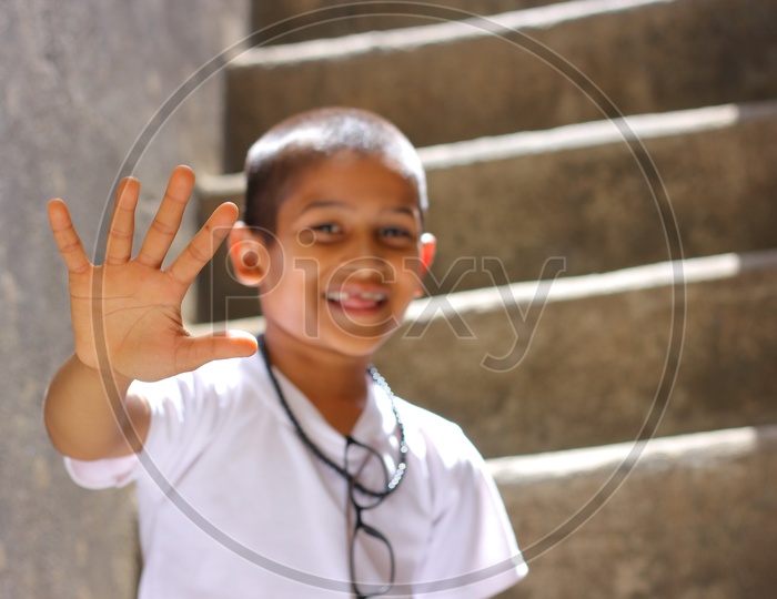 Indian Child showing Hand or Indian Kid