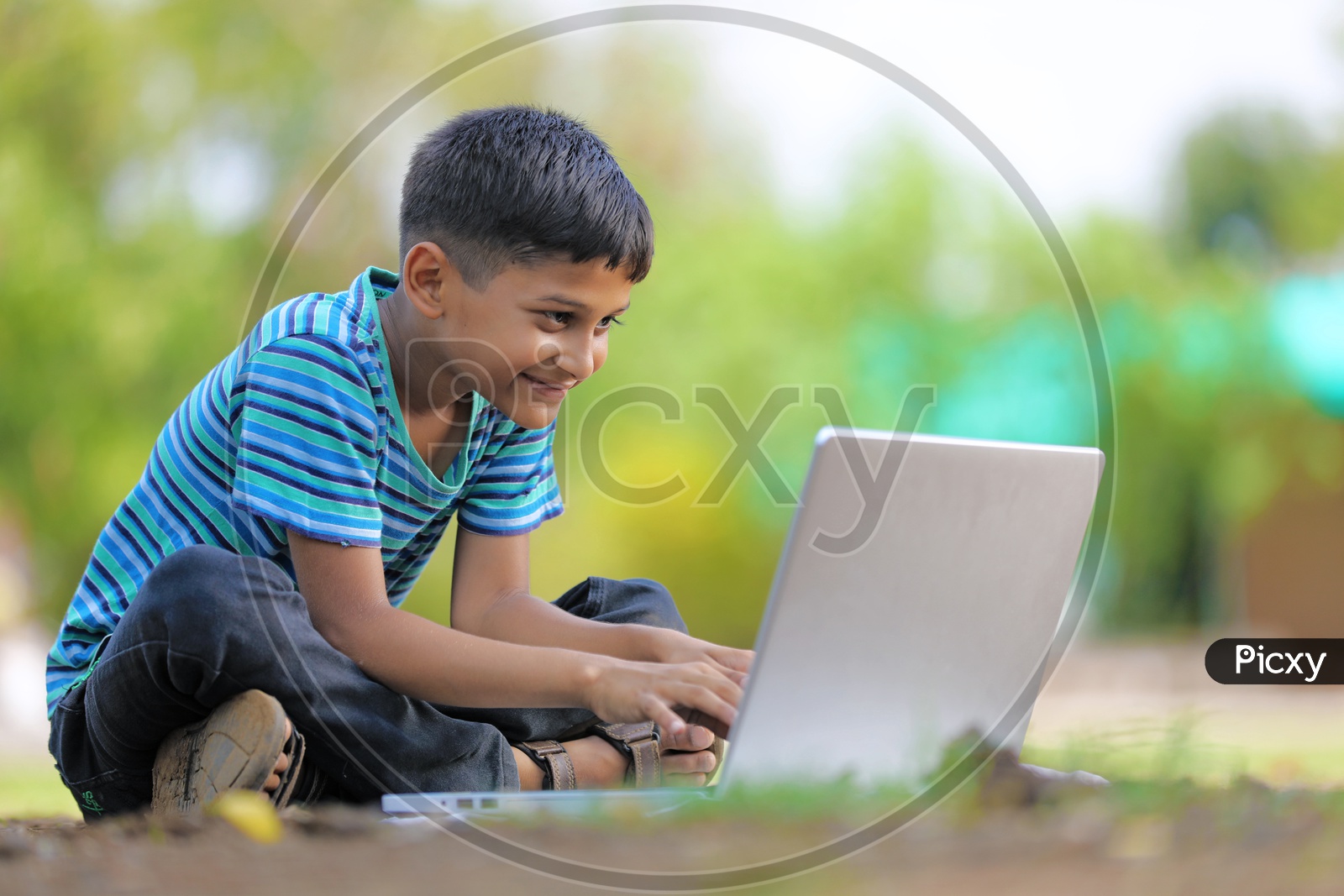 Indian Child using Laptop