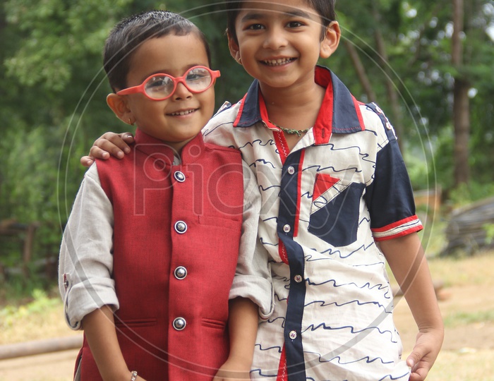 Indian Children Posing for a Portrait