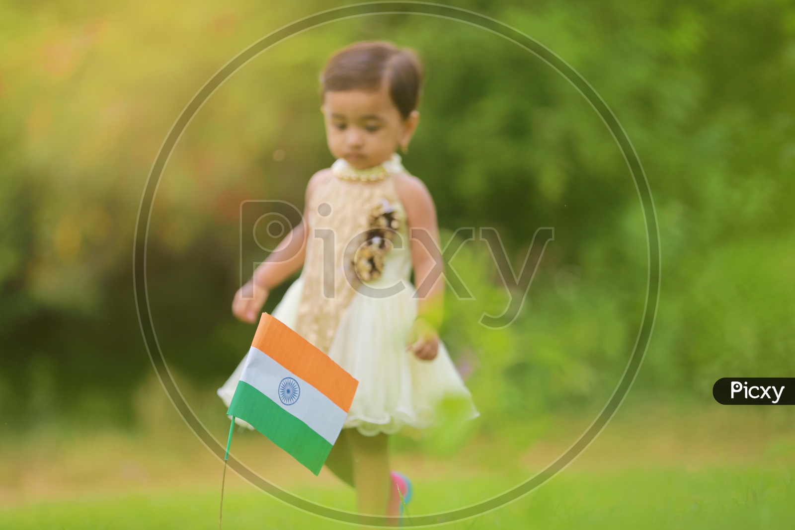 indian flag with kid in the background