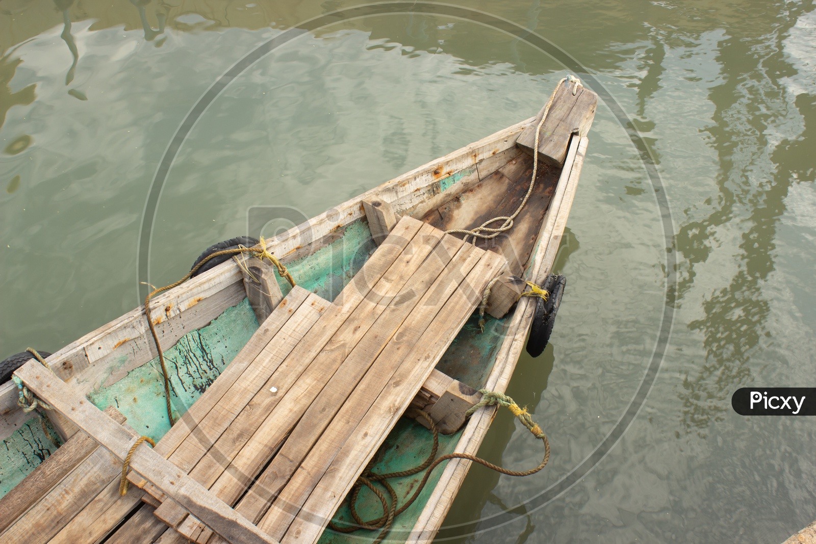 A Wooden Boat in Water  Closeup Shot