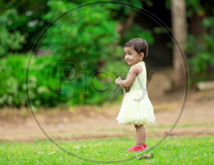 cute little kid portrait with green background / kids photography