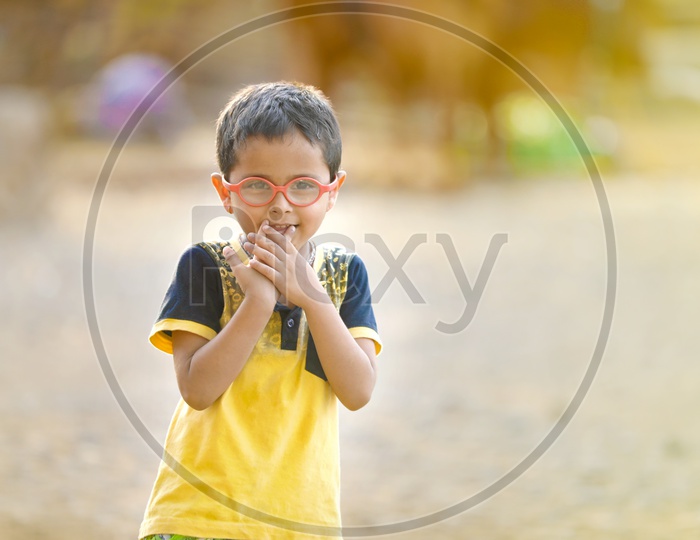 Indian Smiling/Funny/naughty Kid Child with Spectacles