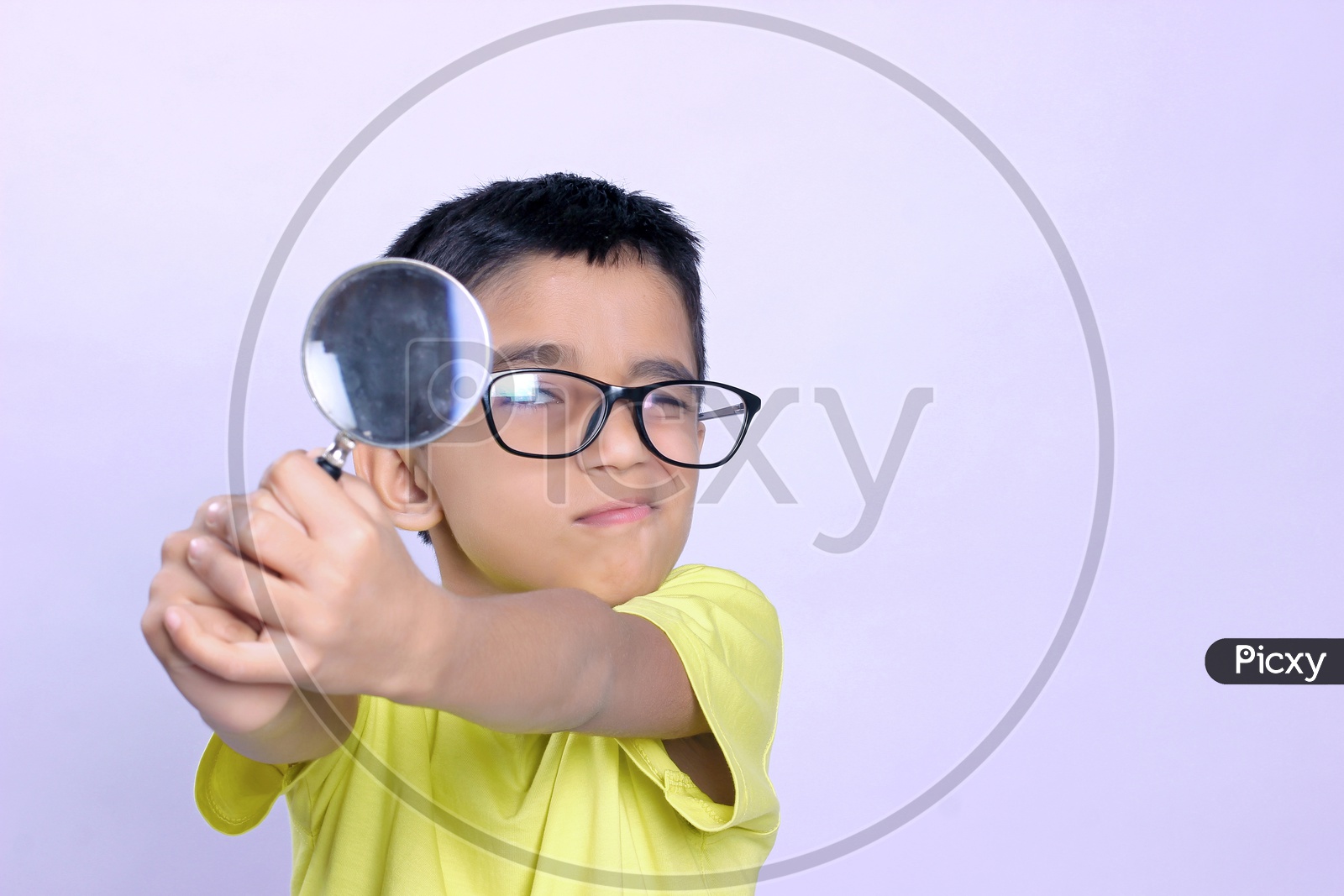 Indian Child on Eyeglass Holding Magnifying Glass