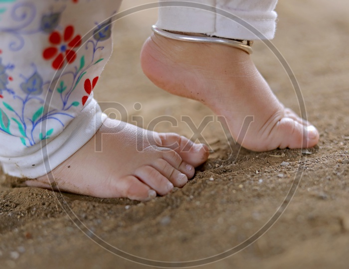 Close-up of Baby Feet/Tiny feet trying to walk