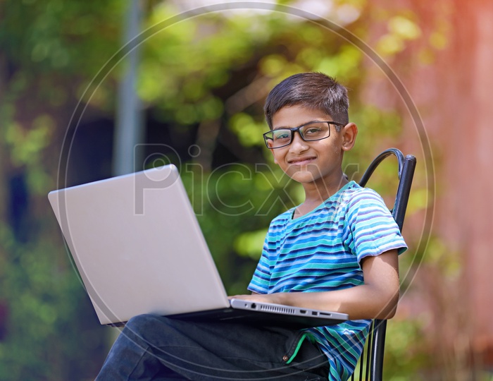 Indian Child using Laptop