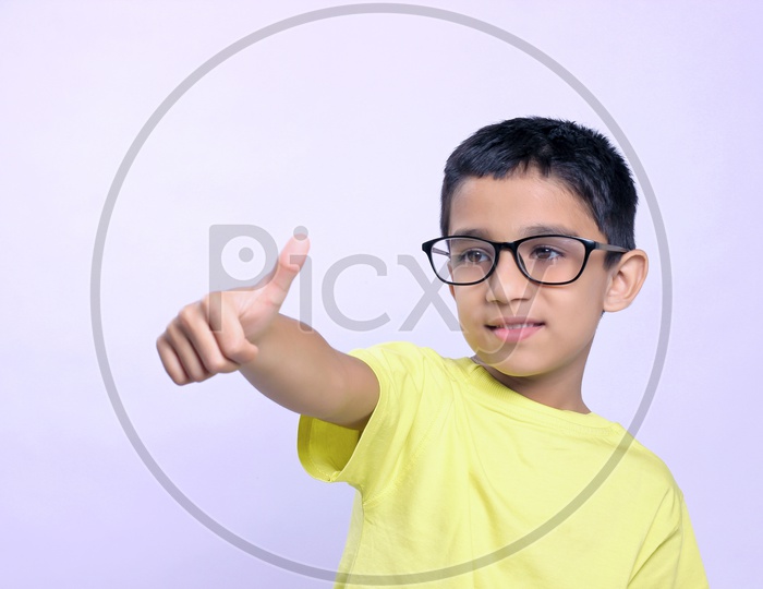 Indian Child showing Thump up