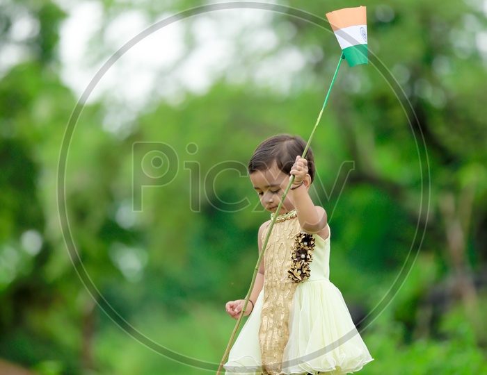 Indian Girl Child Holding Indian Flag