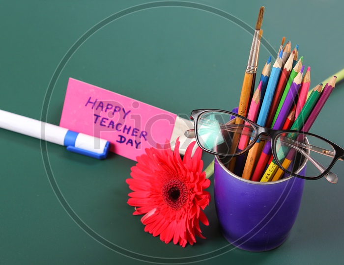 Happy Teacher Day Concept, Eye wears and Pencils