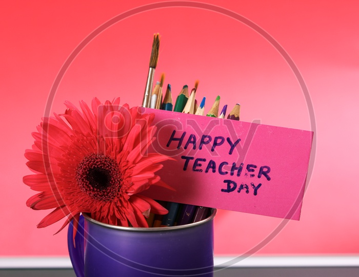 Happy Teacher Day Concept and Pencils