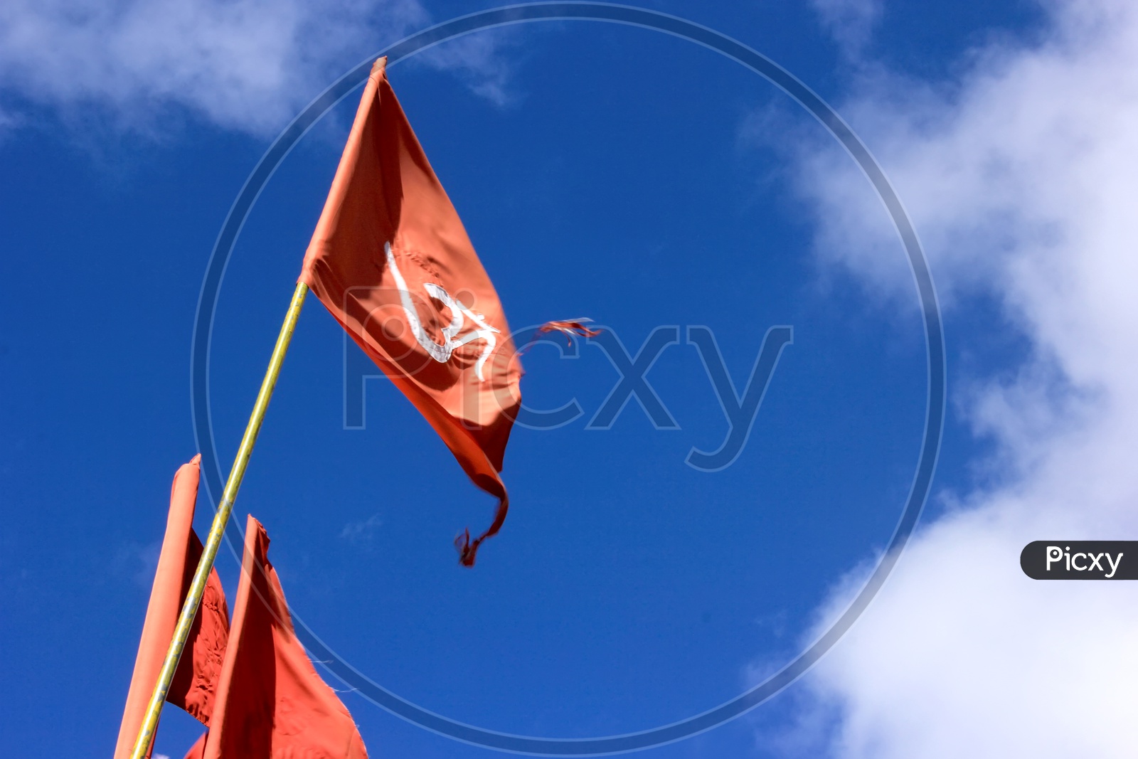 Red Flags with a blue sky background
