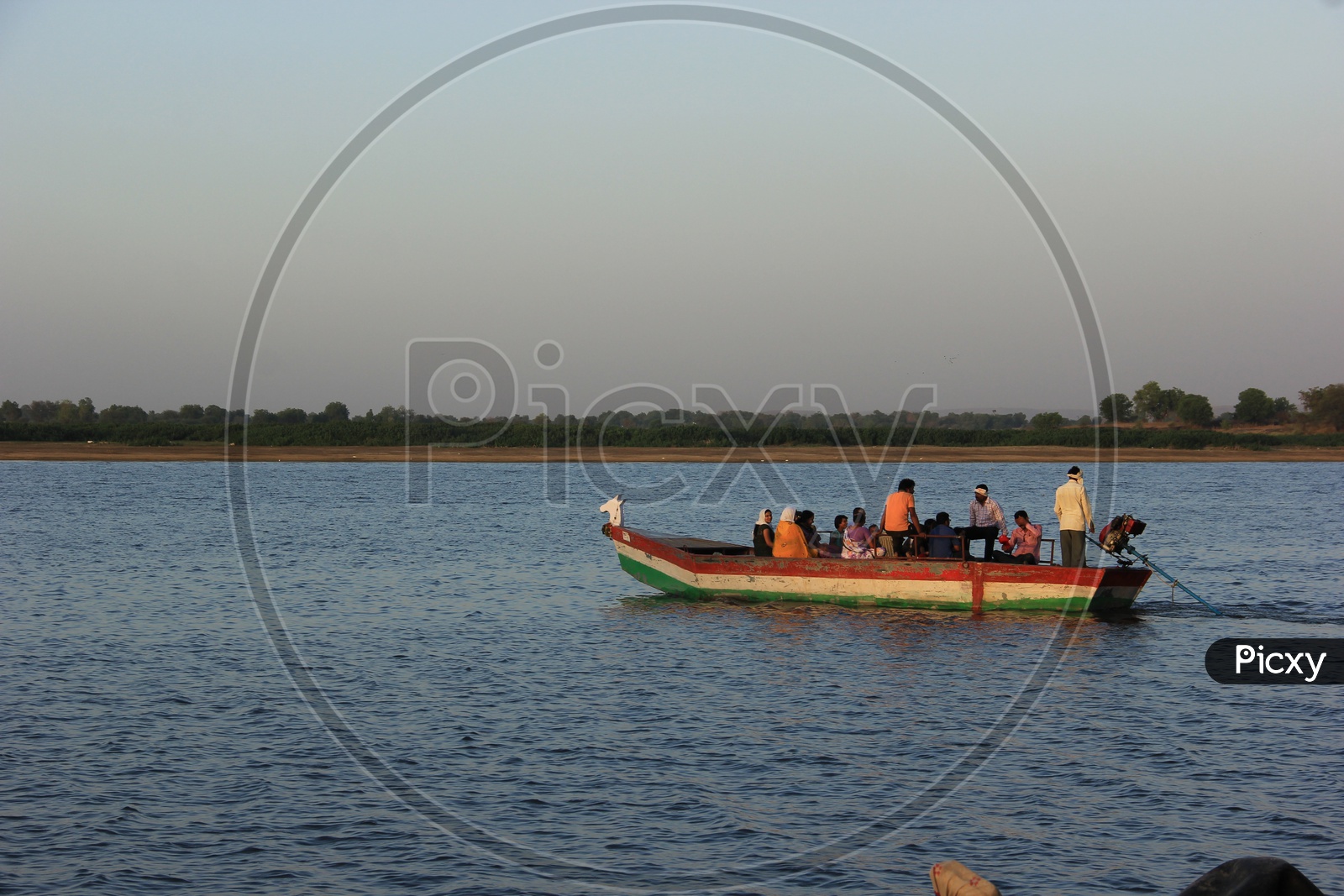 People traveling in Boat across the river