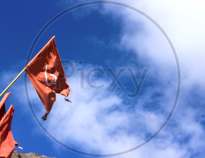 Flags with a blue sky background