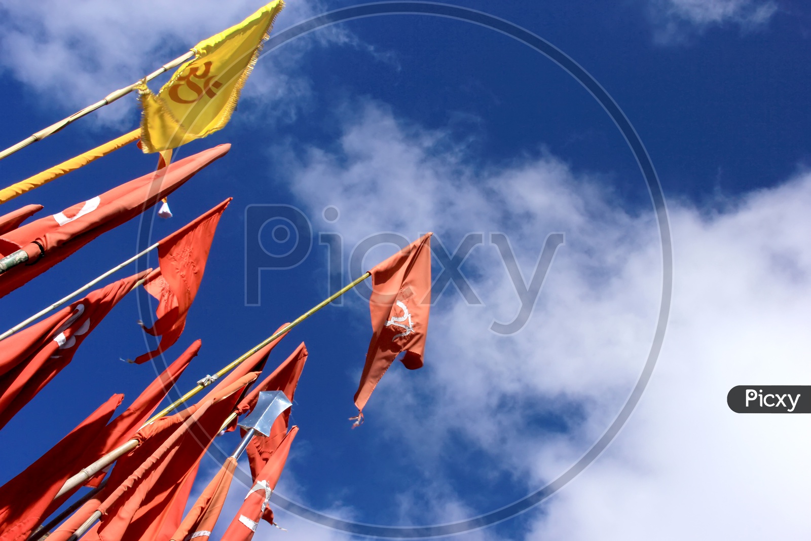Flags with a blue sky background