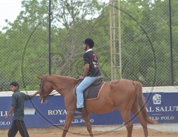 Child Riding Horse at Hyderabad Polo and Horse Riding Club