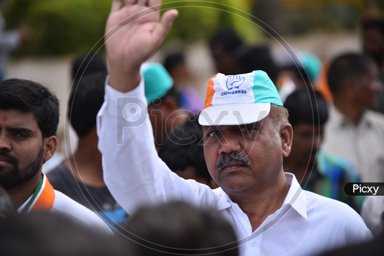 Congress Supporters Wearing Caps In Elections Campaign