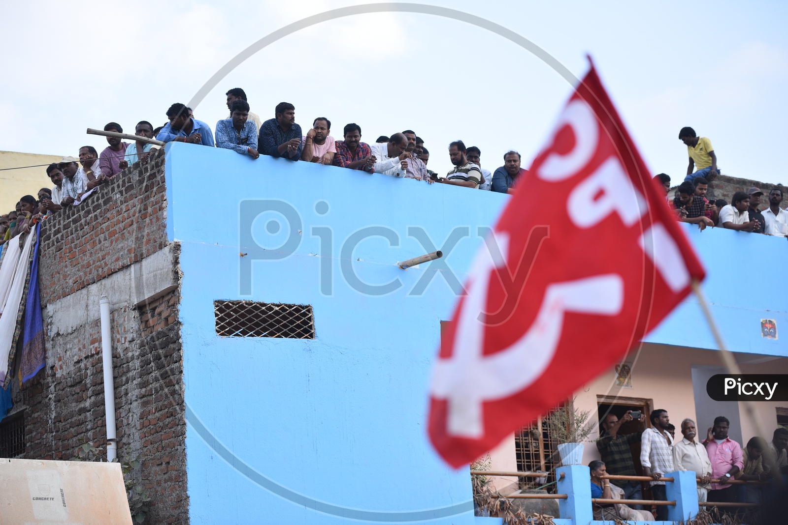 CPI Flags in Kosigi Roadshow By Revanth Reddy