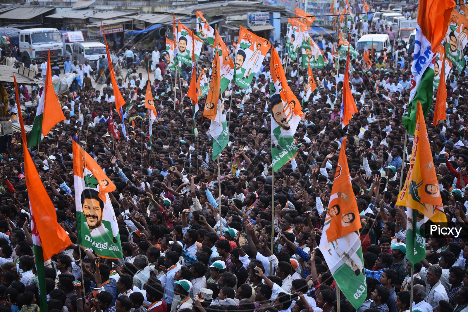 Crowd and Party Flags In Road Show By Revanth Reddy in Kosgi