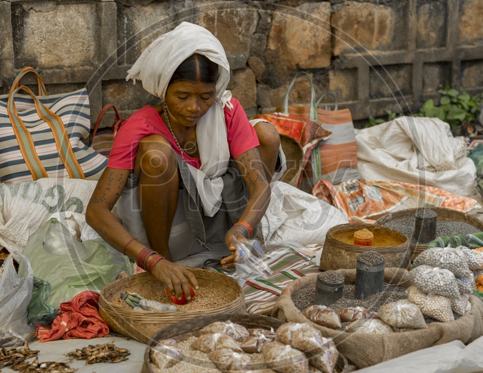 Tribal Woman Selling Cereals