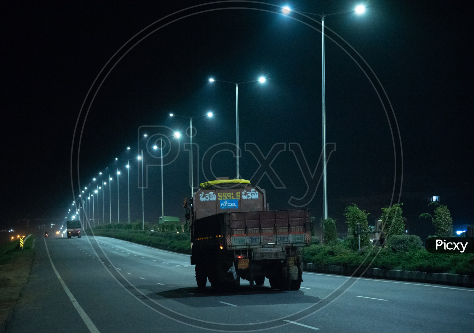 Heavy Vehicles under the LED Lights on NH 16 at nights.