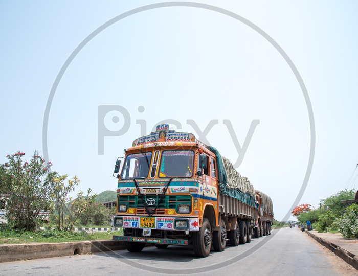 Lorry's running on the NH 16, Chennai-Kolkata highway halts near Odisha Border in Srikakulam to get their Food supplies ready.