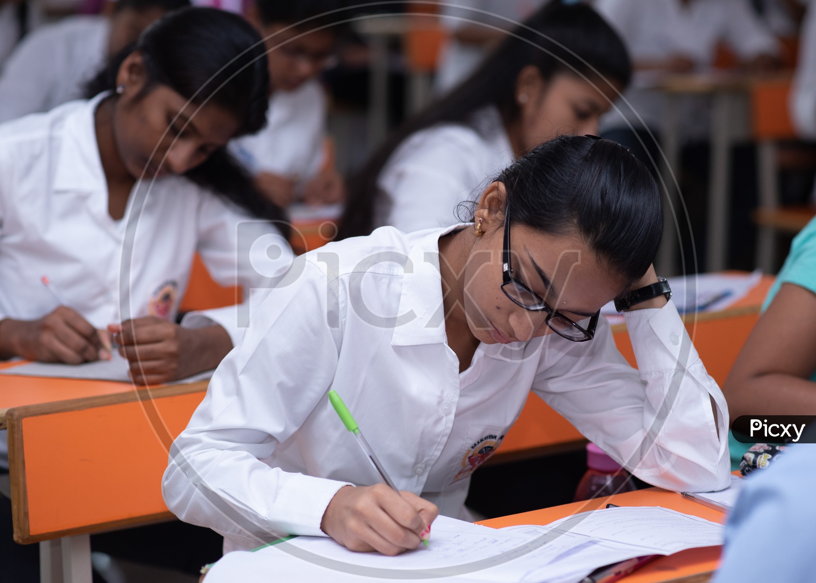 Girl writes her exam in an educational institute in Telangana