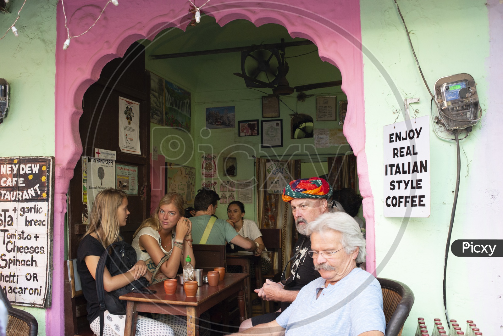 Foreign Tourists in a Italian Style Coffee Shop at Pushkar, Rajasthan