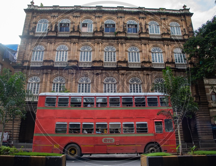 Double Decker Bus in Mumbai against historic building