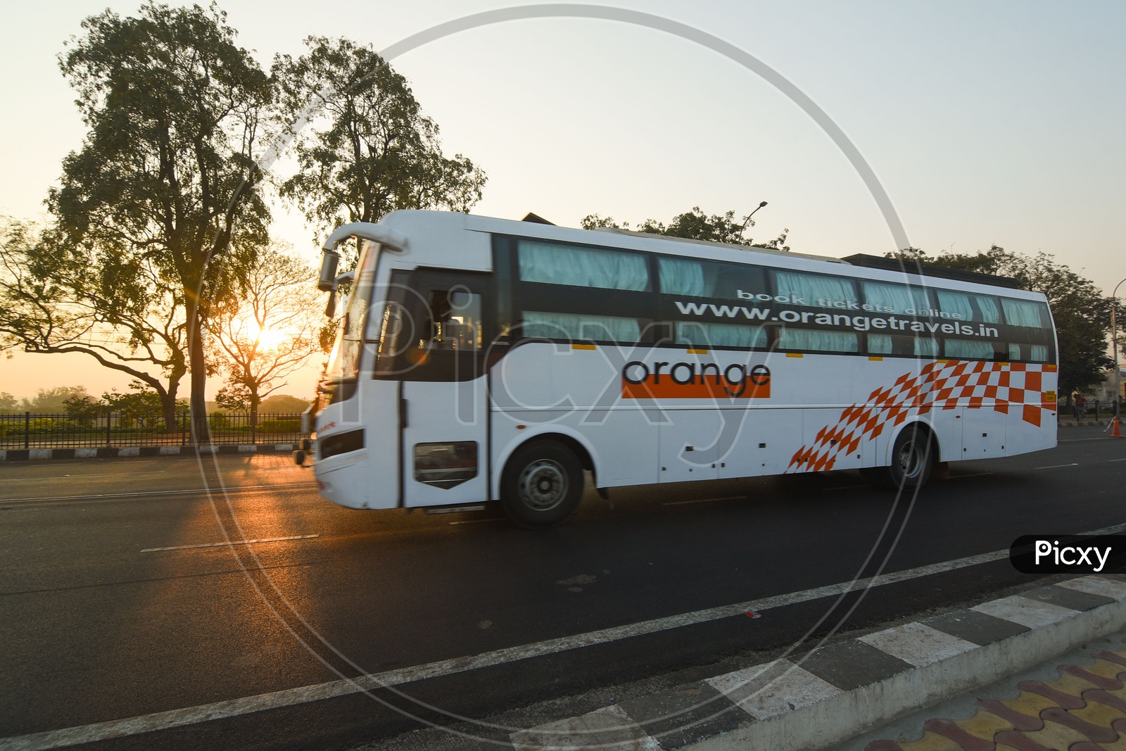 Orange Travels Bus